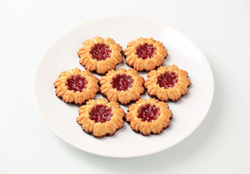 Chocolate dipped butter cookies with jelly center