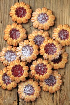 Chocolate dipped butter cookies with jelly center