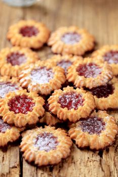 Chocolate dipped butter cookies with jelly center