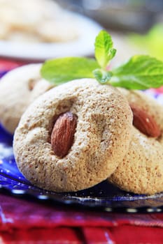 Crispy almond macaroons on a plate - detail