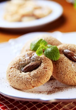 Crispy almond macaroons on a plate - detail