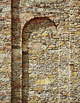 background or texture old stone castle wall with arch