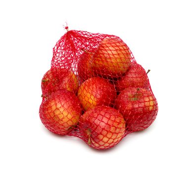 The heap of apples packaged in the red net