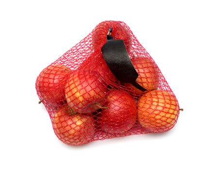 The heap of apples packaged in the red net