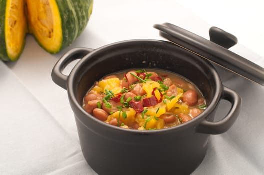 Soup with beans and squash with chilli powder, italy