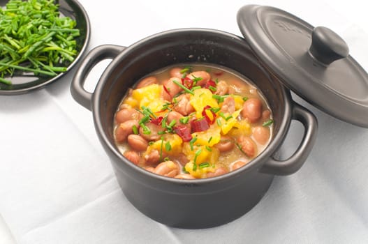 Soup with beans and squash with chilli powder, italy