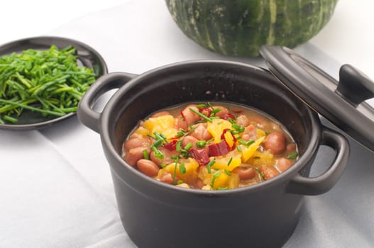 Soup with beans and squash with chilli powder, italy