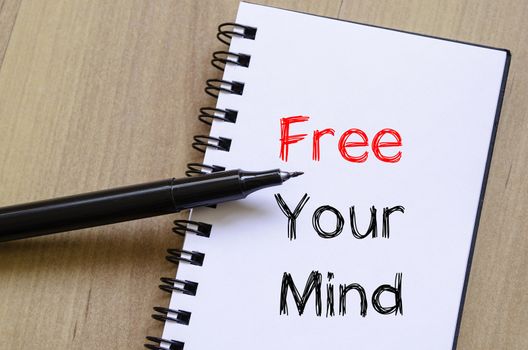 Free your mind text concept write on notebook