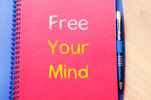Free your mind text concept write on notebook