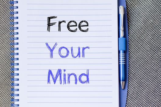 Free your mind text concept write on notebook
