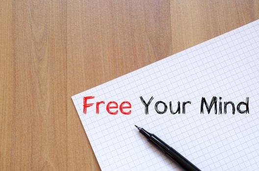 Free your mind text concept write on notebook