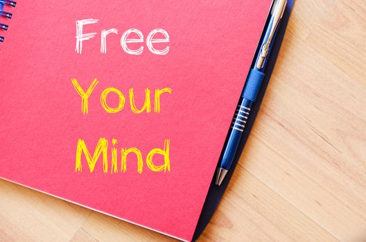 Free your mind text concept write on notebook
