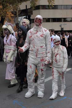 CANADA, Montreal: People disguised in zombies take part in the Zombie Day of Montreal, on October 31, 2015.