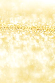 Abstract shining glitters gold holiday bokeh background