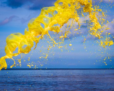 Yellow watercolour splash on sea background