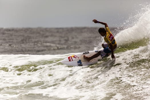 SNAPPER ROCKS, GOLD COAST, AUSTRALIA - 9 MARCH: Unidentified Surfer races the Quicksilver & Roxy Pro World Title Event. 9 March 2013, Snapper Rocks, Gold Coast, Australia