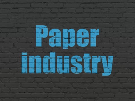 Manufacuring concept: Painted blue text Paper Industry on Black Brick wall background