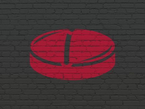Health concept: Painted red Pill icon on Black Brick wall background