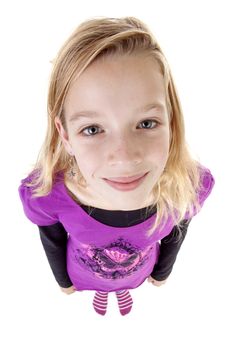 teenage girl in studio seen from above; big head little feet over white background