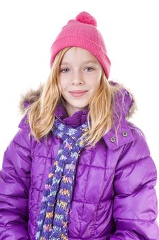 Teenage girl is posing in winter outfit over white backgroung
