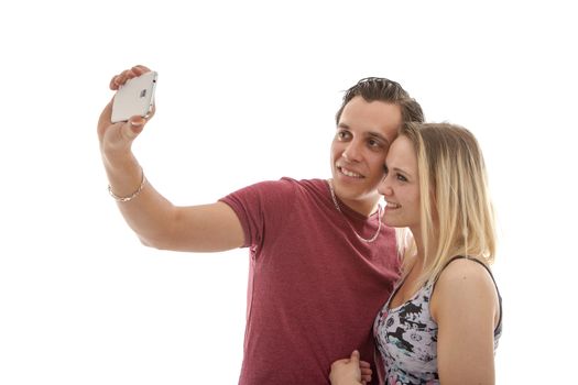 Young couple making selfie over white background