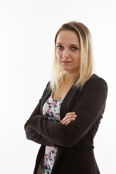 Young business woman with arm crossed over white background