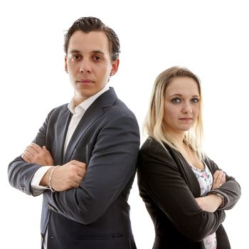 Business couple with arms crossed over white background