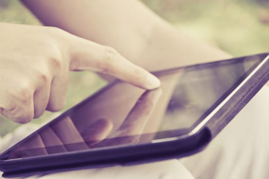 close up of people using digital tablet background