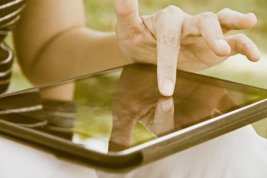 close up of people using digital tablet background