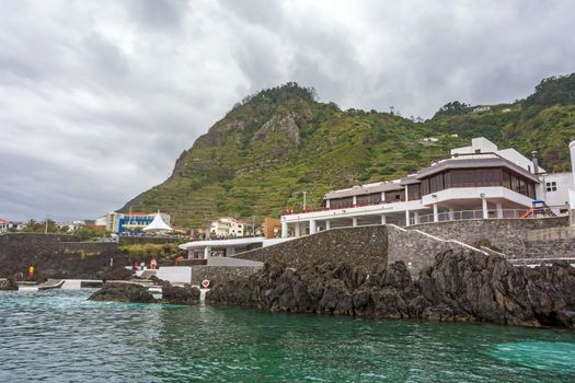 Porto Moniz, Portugal - June 2, 2013: Natural rock pool of Porto Moniz. It is a public bath with water from the Atlantic Ocean.