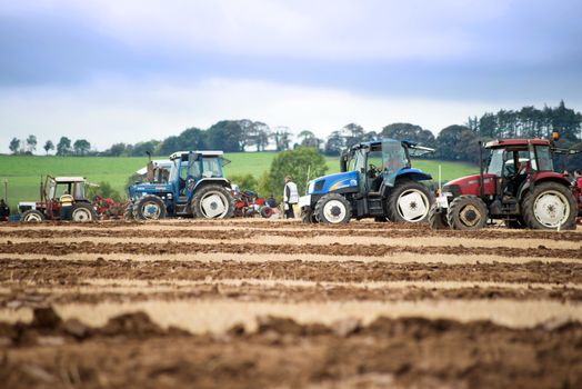 tractors competing in the irish national ploughing championships in ireland