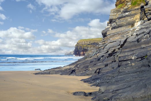 cliffs on the beach of ballybunion in the wild atlantic way ireland