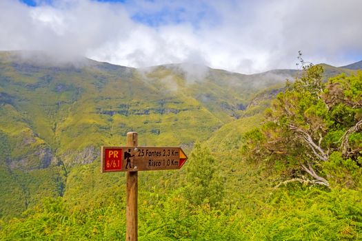 Signpost showing the walkway to the 25 Fontes (25 fountains), a famous hiking trail on the island Madeira, Portugal