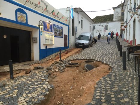 PORTUGAL, Albufeira : A road has been devastated by flash floods, on November 2, 2015. A man aged 79 died during the flooding. 