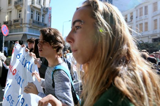 GREECE, Thessaloniki: Students march with a sign as hundreds more rally in Thessaloniki, Greece's second-largest city, on November 2, 2015. They carry signs as they march to the Ministry of Macedonia and Thrace, protesting against the shortage of teaching staff in their schools and demanding more funding for education amid continued rallies against austerity.
