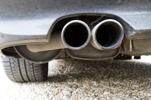 tailpipes of a car showing where the exhaust comes from