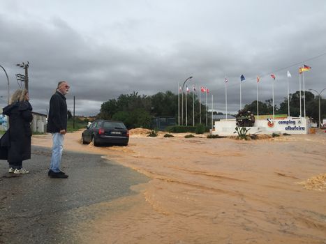 PORTUGAL, Albufeira: The streets of Albufeira, Portugal are completely flooded on November 1, 2015 following heavy rainfall that left at least one person dead and several others homeless in the southern part of the country. The one death reported thus far was of a 79-year-old man, who had intended to go shopping in Boliqueime when his car was overcome by rising water.