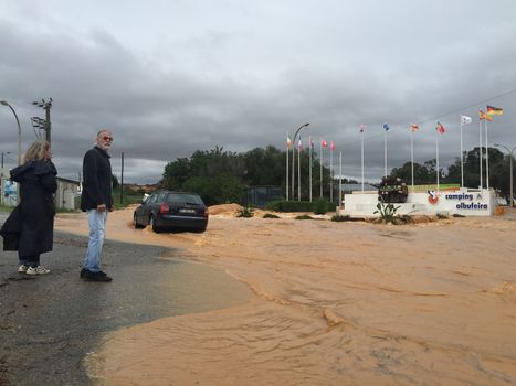 PORTUGAL, Albufeira: The streets of Albufeira, Portugal are completely flooded on November 1, 2015 following heavy rainfall that left at least one person dead and several others homeless in the southern part of the country. The one death reported thus far was of a 79-year-old man, who had intended to go shopping in Boliqueime when his car was overcome by rising water.