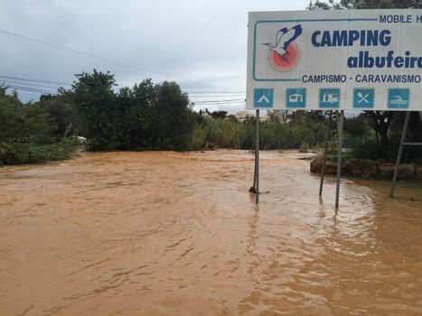 PORTUGAL, Albufeira: The streets of Albufeira, Portugal are completely flooded on November 1, 2015 following heavy rainfall that left at least one person dead and several others homeless in the southern part of the country. The one death reported thus far was of a 79-year-old man, who had intended to go shopping in Boliqueime when his car was overcome by rising water.