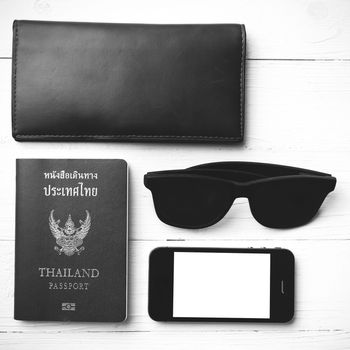 travel gadget over white table black and white color