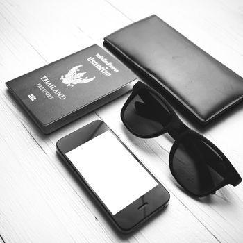 travel gadget over white table black and white color