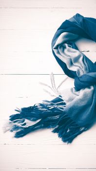 blue scarf over white wood table background vintage style