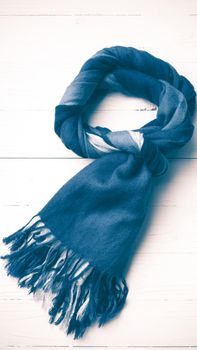 blue scarf over white wood table background vintage style