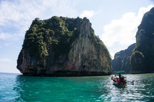 Phi Phi Island was very famous island in Phuket, Thailand. Tourist come from everyway to visit here, the was crystal clear, can see the base ocean by nake eye. The natural mountain was amazing. This is take it at small Phi Phi island, Maya bay.
