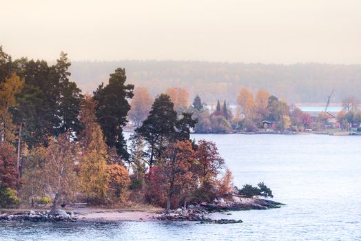 Morning mist along the shores and islands. Swedish sea fjord