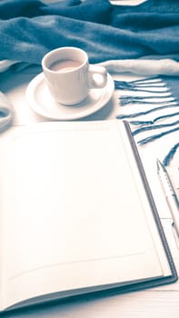 coffee and scarf background on white table vintage style