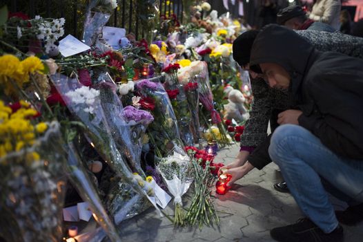 UKRAINE, Kiev: People light candles outside the Russian embassy in Kiev, Ukraine, in tribute to the victims of crashed Russian Metrojet plane in Egypt, on November 1, 2015. The Airbus, with 224 people on board, crashed in a mountainous part of Egypt's Sinai Peninsula on October 31, 2015