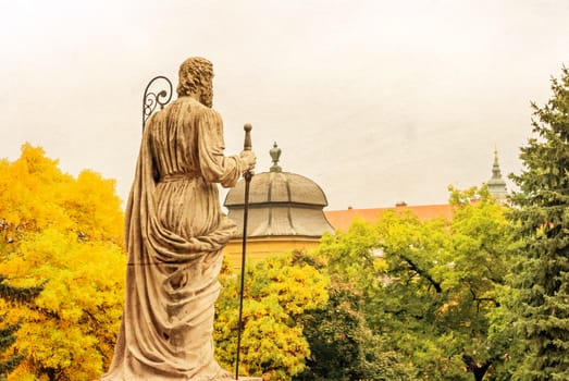 Sculpture basilica and view of the ancient city of Eger, Hungary. It was built between 1831 - 1837 in classicist designs by Joseph Hild. Photo in old color image style.