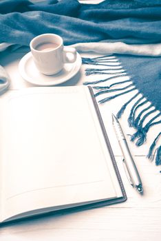 coffee and scarf background on white table vintage style