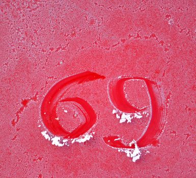 picture of a Text on a red frost metal plate